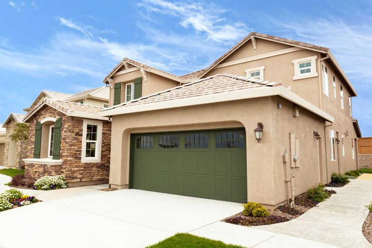 Common Mistakes That Drive Up Your Garage Door Service Costs