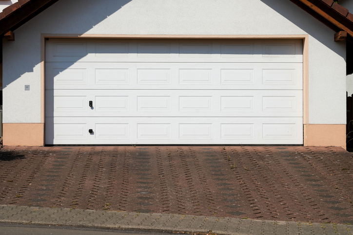 How Routine Garage Door Maintenance Saves Money Over the Long Term