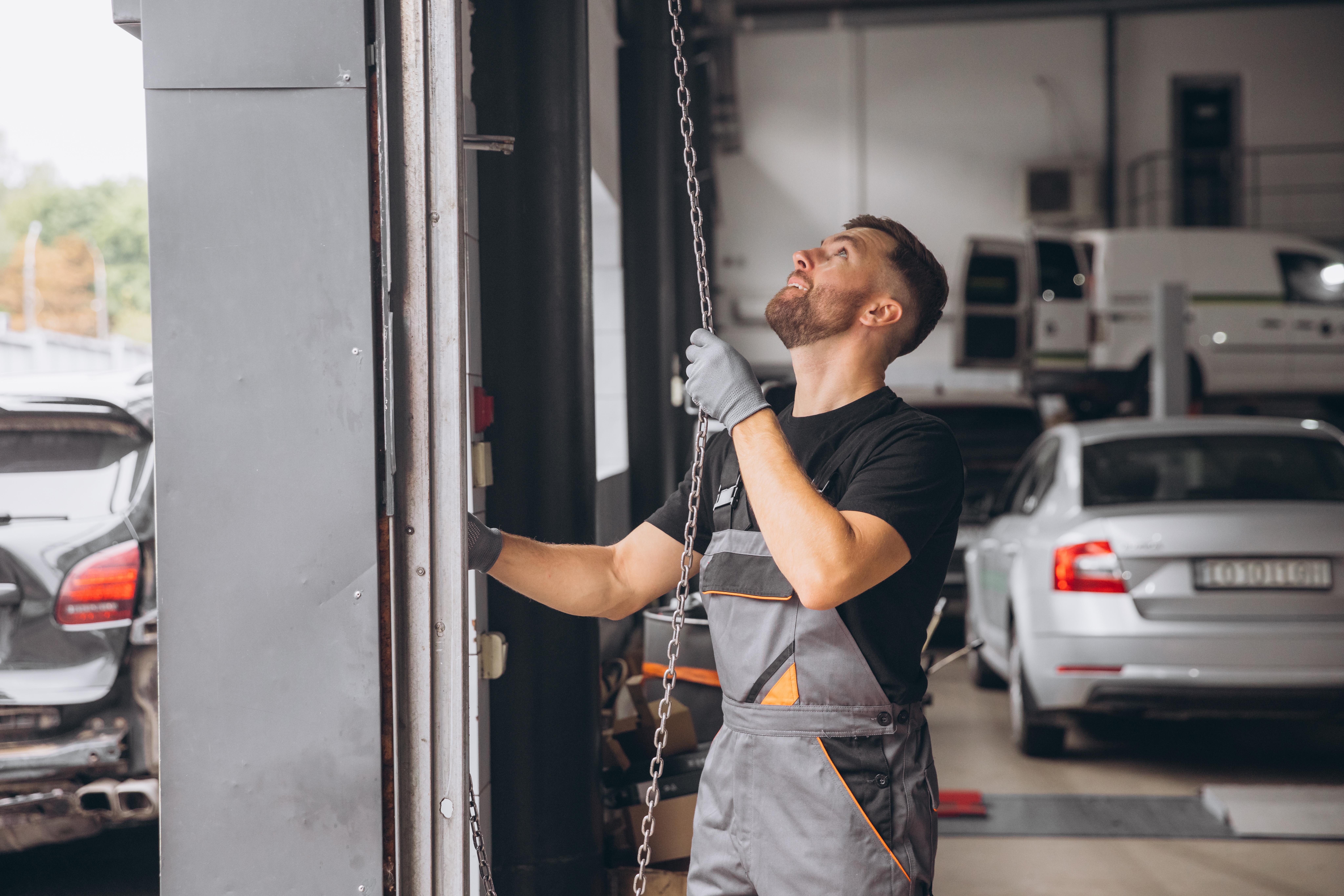 homeowner troubleshooting when garage door opener stops working with remote and control panel