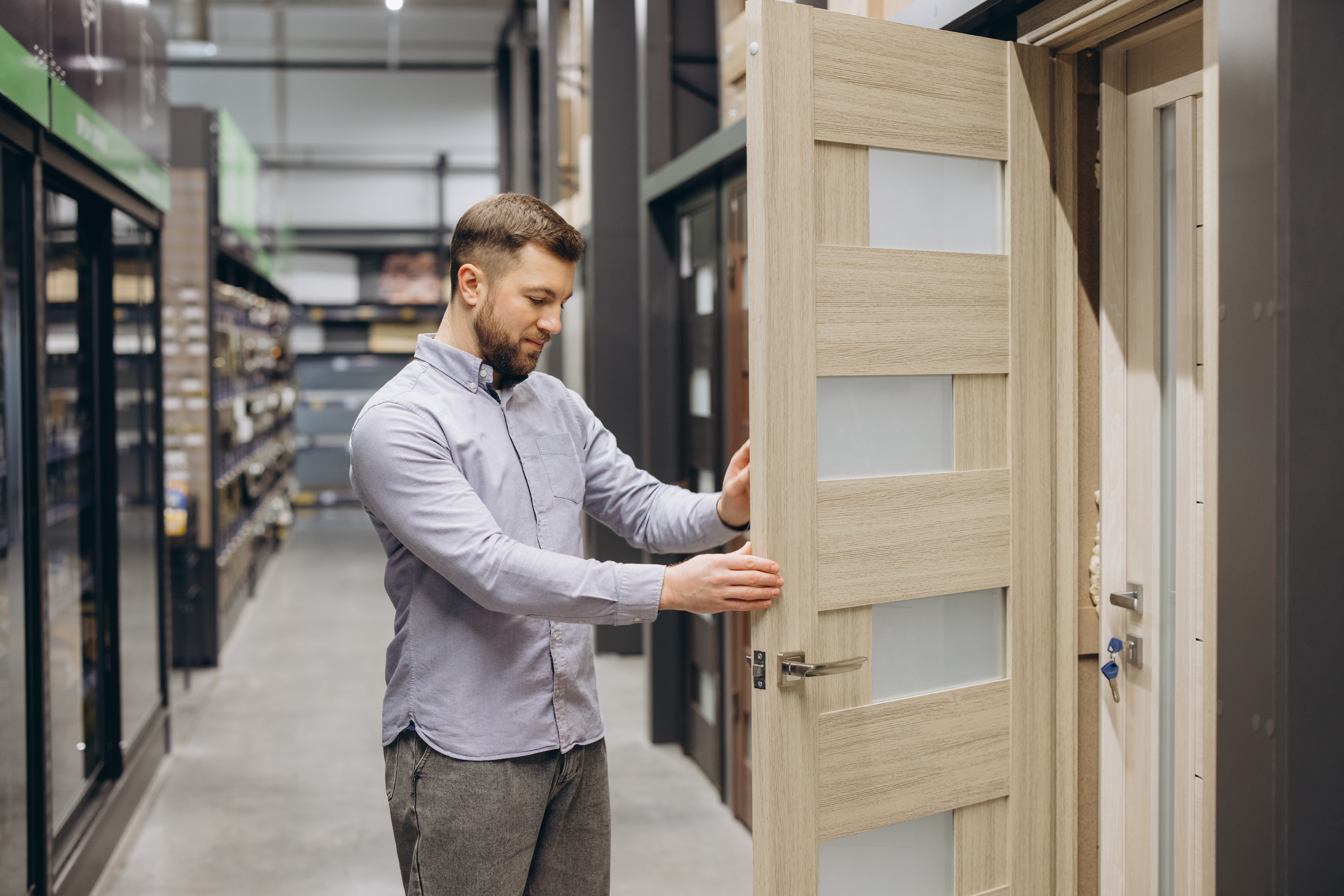 business owner reviewing commercial doors in Baton Rouge before installation