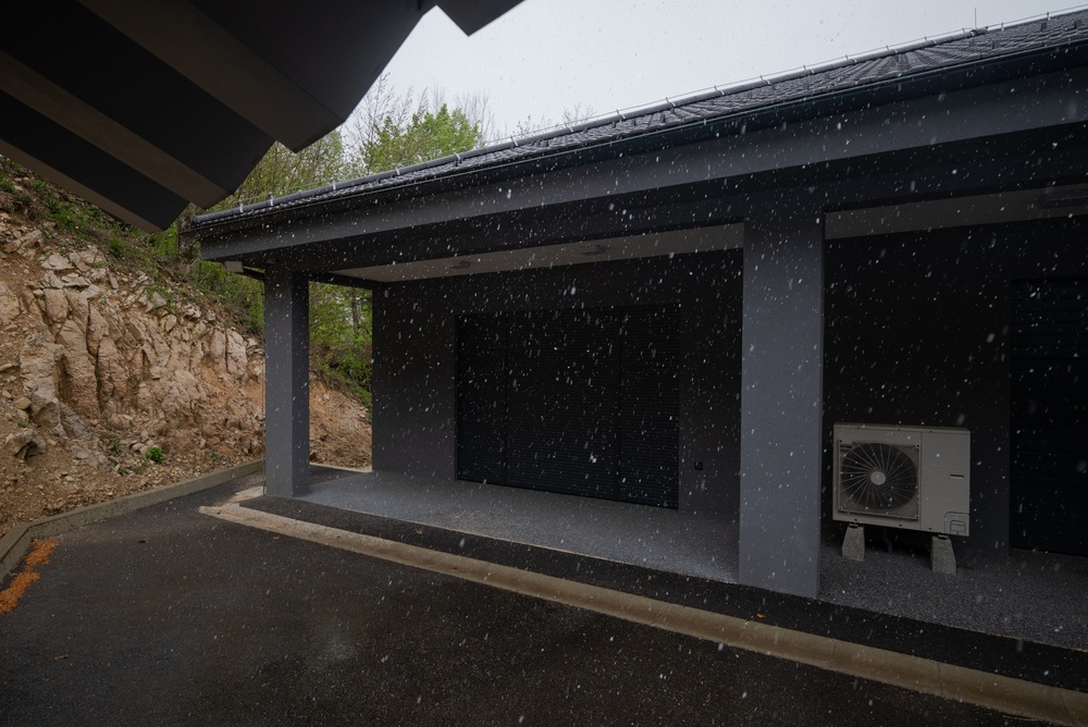 Modern smart garage with a Wi-Fi garage door opener controlled by a smartphone app in 2026