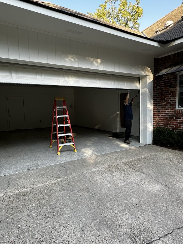 Modern home featuring garage door panel upgrades that improve exterior appearance and curb appeal