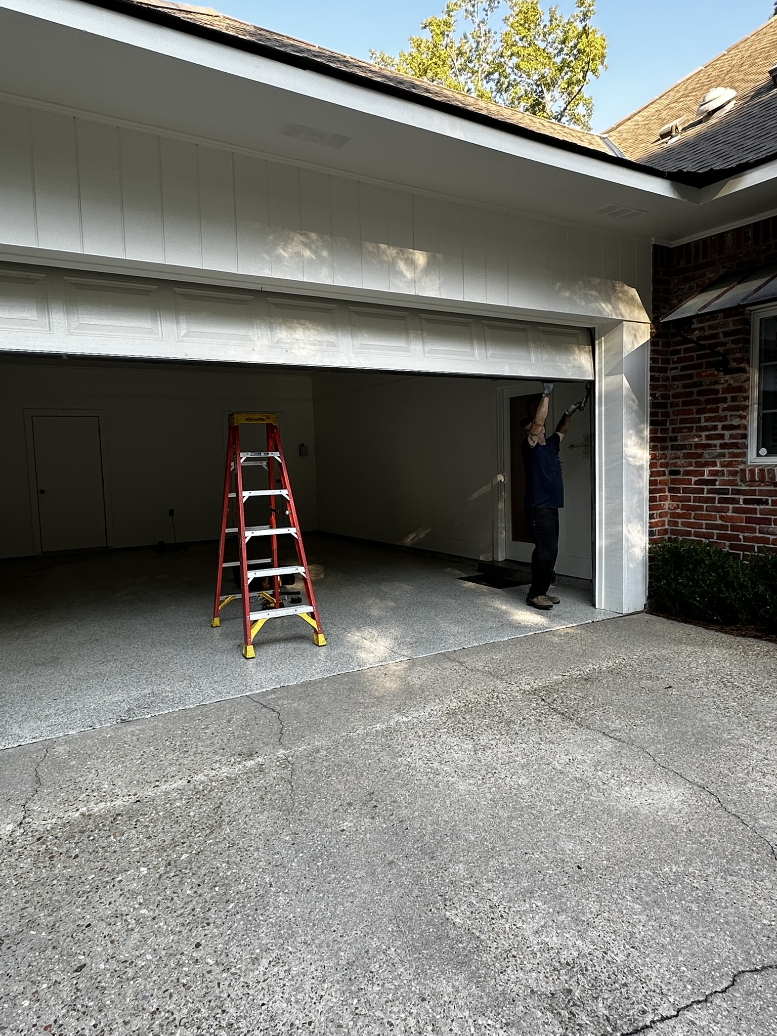 Modern home featuring garage door panel upgrades that improve exterior appearance and curb appeal